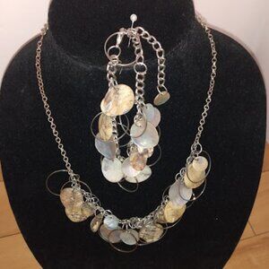 Silver tone chain link seashell necklace & bracelet set.